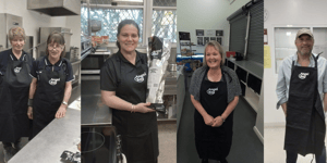 Customers wearing Angel Bay aprons.